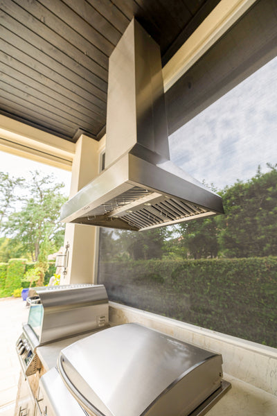 Customer kitchen with the Proline PLJI 103 - Ducted Island Range Hood, 1200 CFM | Stainless Steel Finish, Outdoor Rated Finish Option
