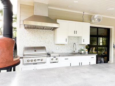 Customer kitchen with the Wall Mounted Range hood, Ducted, 2000 CFM, Thick 304 Stainless Steel | PLGW WC BBQ Ultra