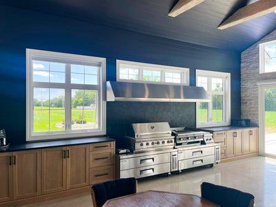 Customer kitchen with the Proline PLJW 109 - Wall-Mounted Range Hood, 1000/2000 CFM | Convertible to Ductless, Stainless Steel Finish, Outdoor Rated
