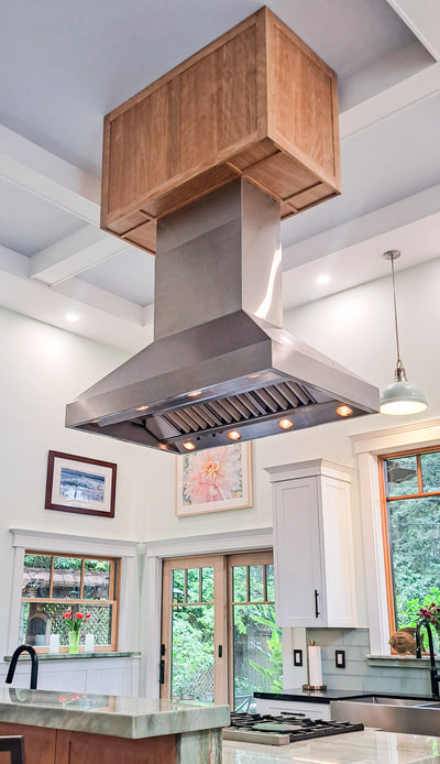 Customer kitchen with the Proline ProVI - Ducted Island Range Hood, Variable CFM | Stainless Steel, Outdoor Rated Finish Option