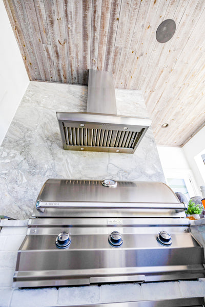 Customer kitchen with the Proline PLJW 109 WC - Ducted Wall-Mounted Range Hood, 1200 CFM | Stainless Steel Finish, Outdoor Rated