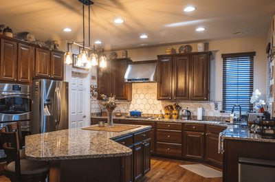 Customer kitchen with the Proline PLJW 101 - Ducted Under-Cabinet Range Hood, 1000/2000 CFM | Stainless Steel Finish