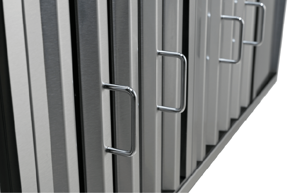 Close-up of drawers showcases the Proline Vortex Insert Range Hood at ProlineRangeHoods.com—sleek and modern.