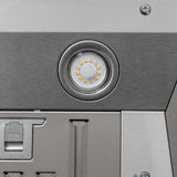 Close-up of a round LED on stainless ProlineRangeHoods.com PLGL Classic Range Hood Insert/Liner (ducted, 1200 CFM).
