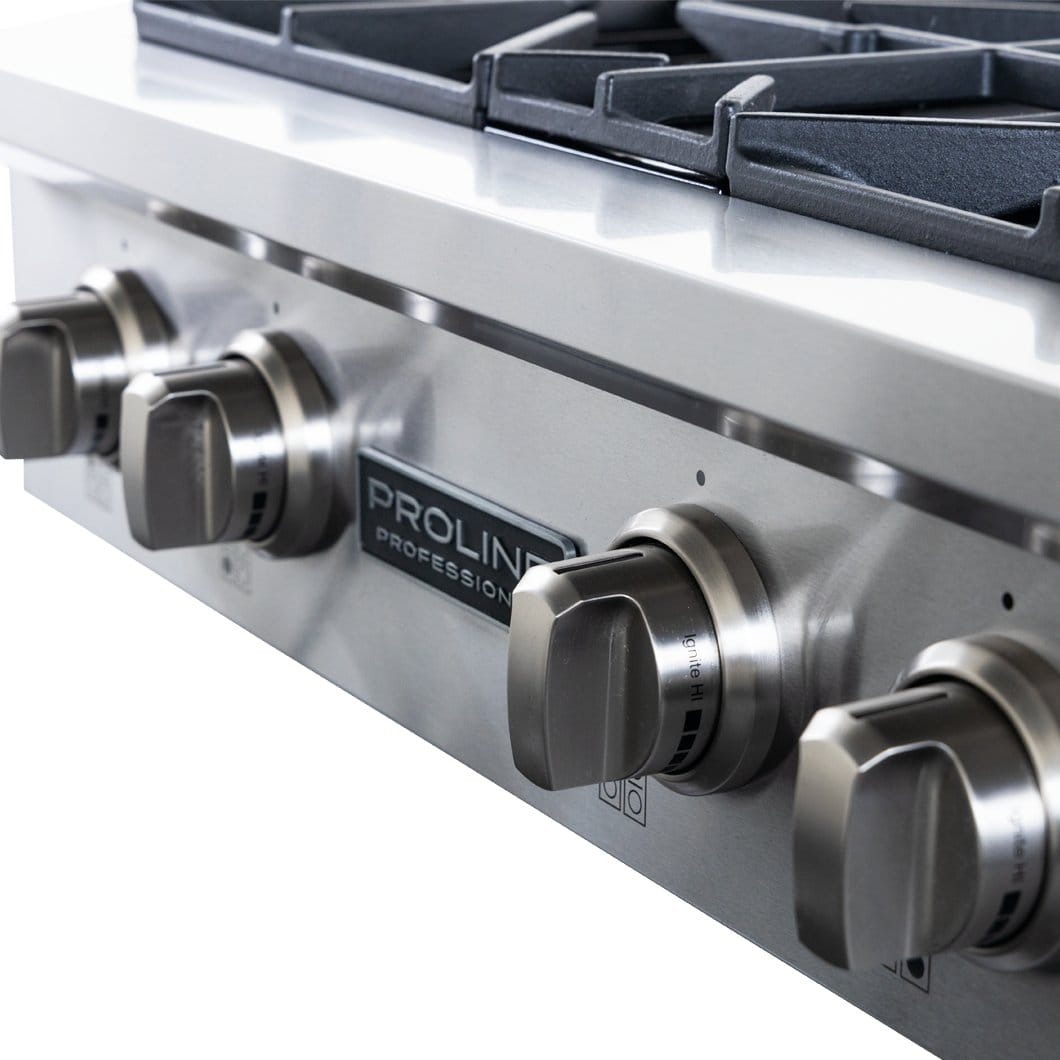 Close-up of four stainless steel knobs on the Proline PLST Gas Range—15,000 BTUs compact design. ProlineRangeHoods.com.