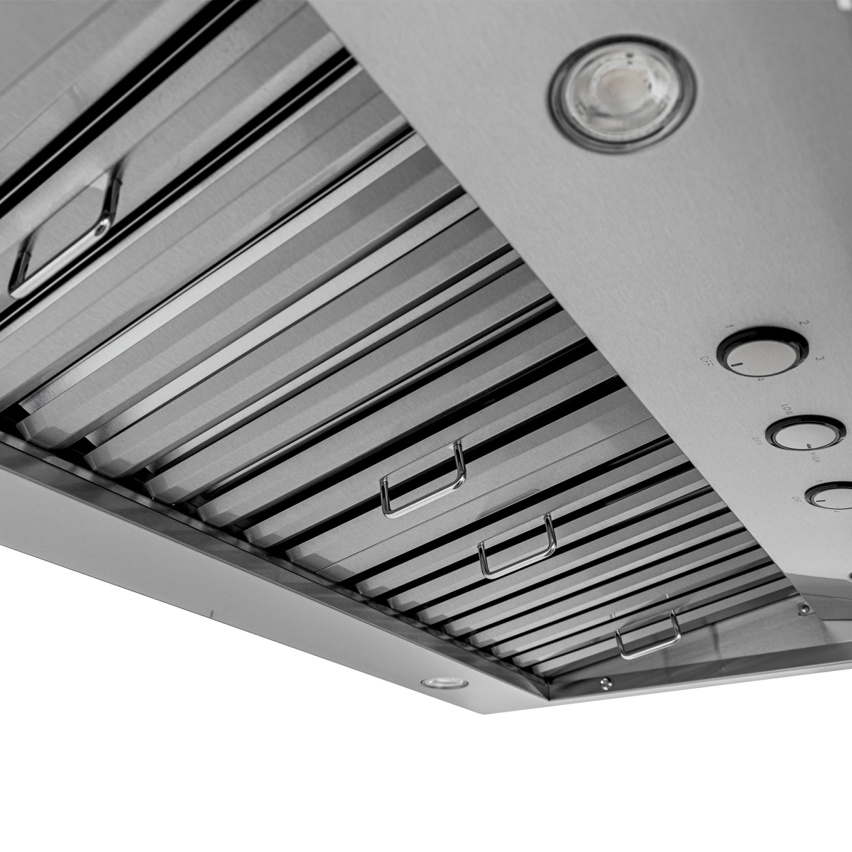 Close-up of Proline PLJW 104 wall-mounted range hood, stainless steel finish, dual 1200 CFM blowers, at ProlineRangeHoods.com.