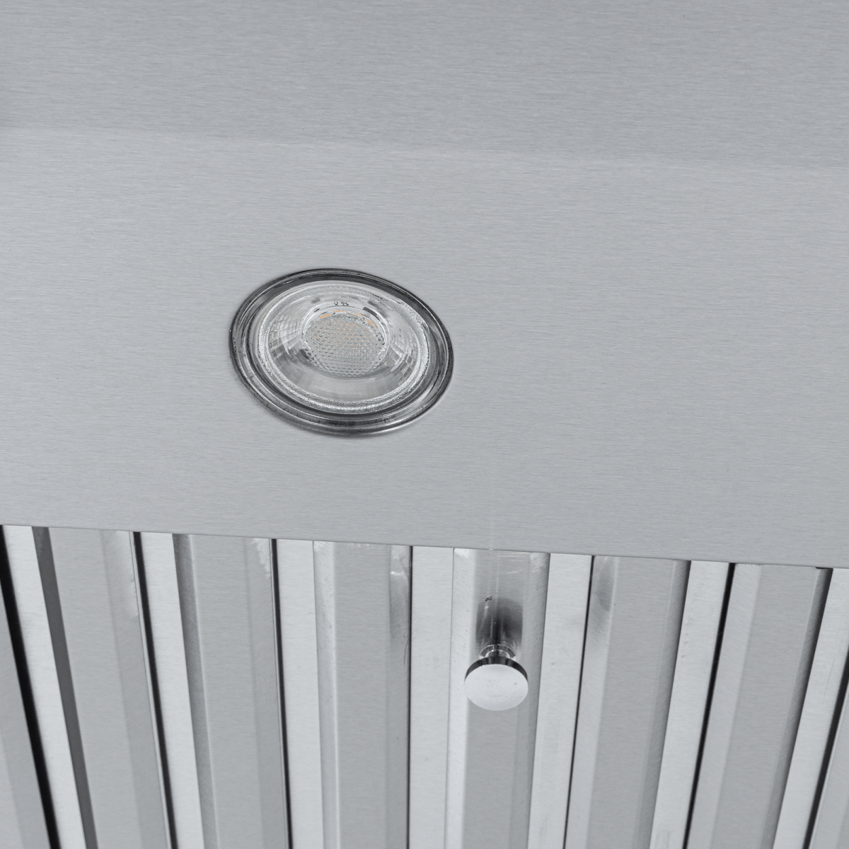Close-up of Proline PLJW 117 range hood, stainless steel, vent slats, baffles; 900 CFM. ProlineRangeHoods.com.