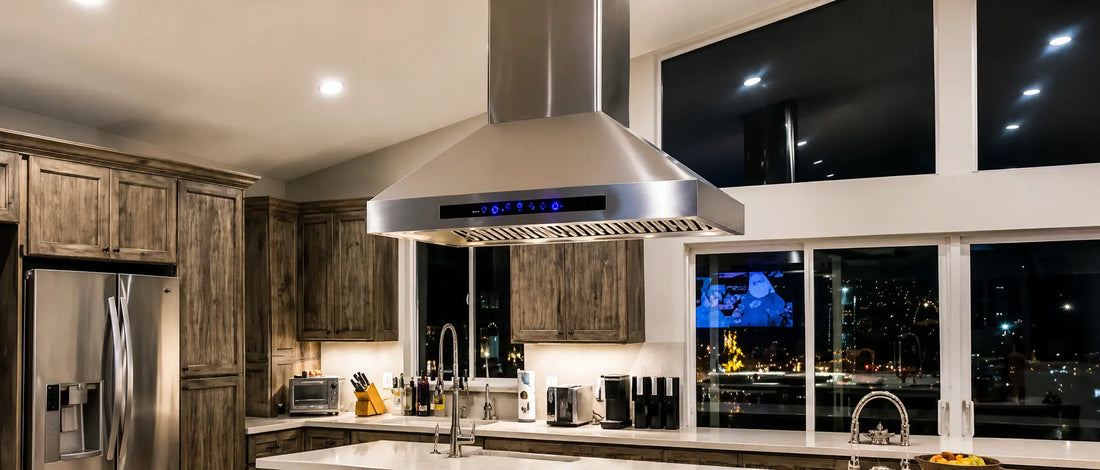 Modern island range hood above a kitchen island cooktop