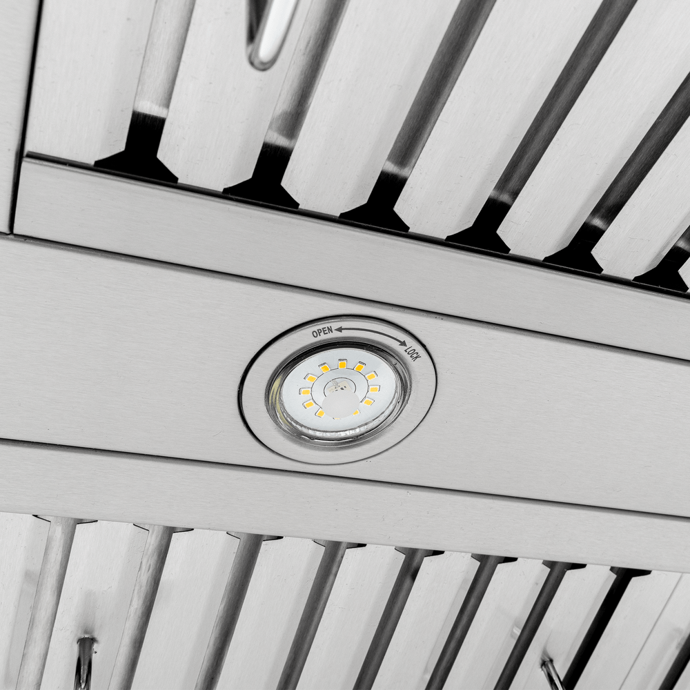 Close-up of Proline PLFW 755 range hood with circular light, stainless steel, 1100 CFM. ProlineRangeHoods.com.