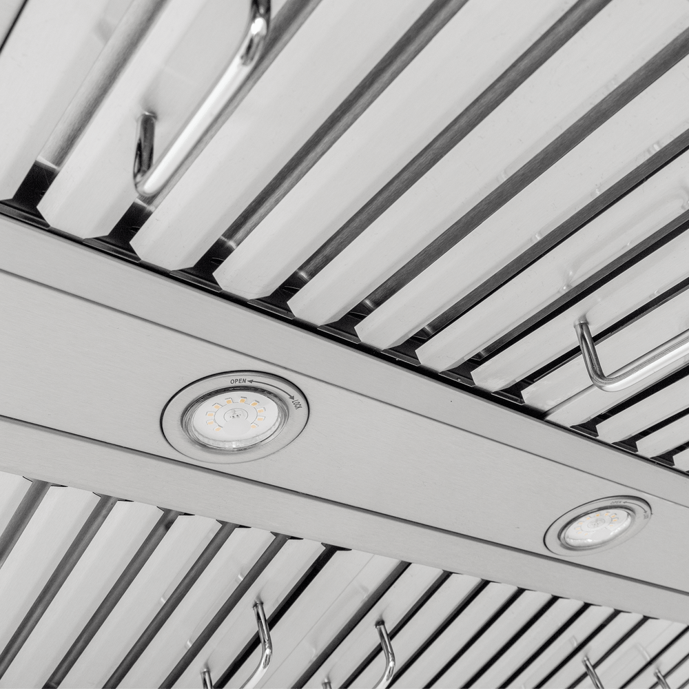 Close-up of Proline PLFW 755 range hood: stainless steel, slatted vents, dual motors, 1100 CFM. ProlineRangeHoods.com.