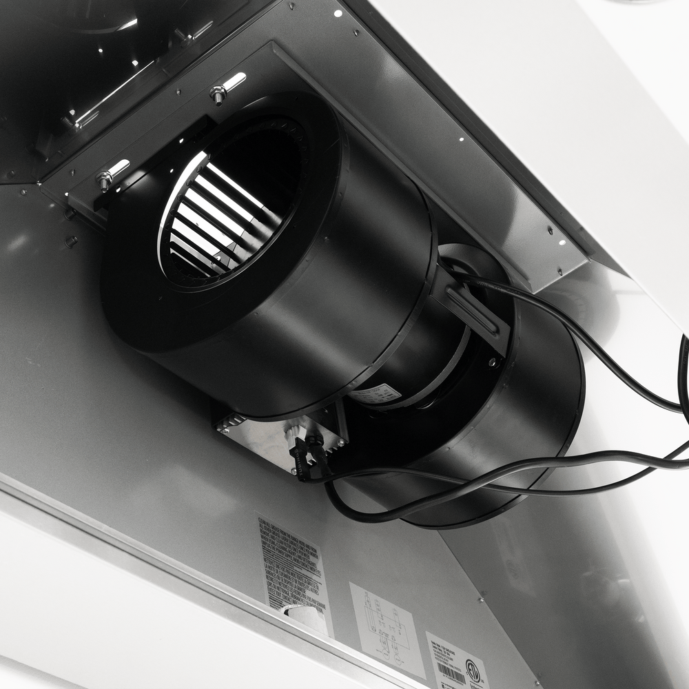 Close-up of Proline Range Hoods 1200 CFM blower in metallic HVAC; quiet, powerful—ProlineRangeHoods.com.