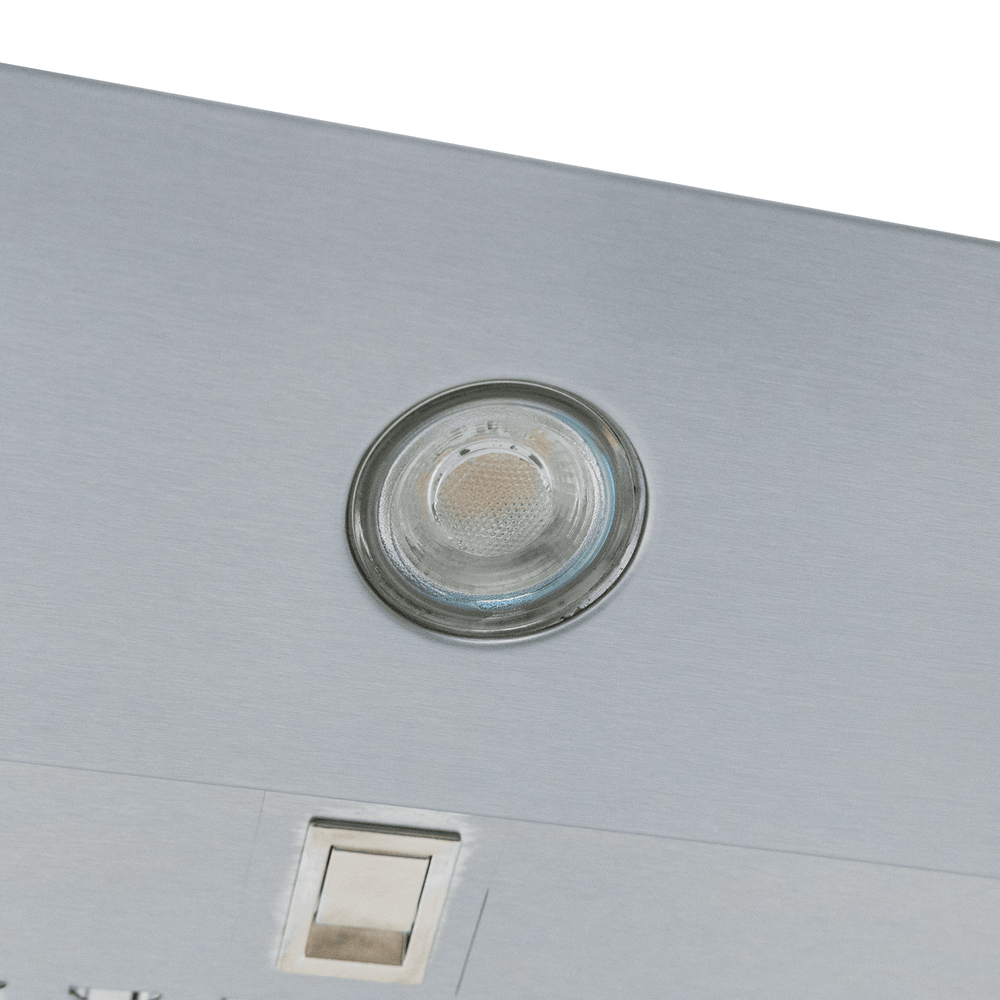 Close-up of Proline PLJW 129 wall-mounted range hood, recessed light, switch, 900/1200 CFM. ProlineRangeHoods.com.