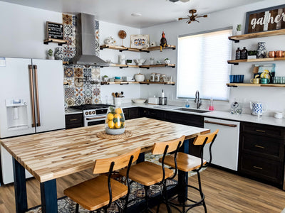 Customer kitchen with the Proline PLFW 520 - Wall-Mounted Range Hood, 600/1200 CFM | Convertible to Ductless, Stainless Steel, Matte Black Finish