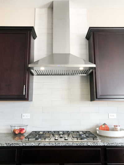 Customer kitchen with the Proline PLJW 129 - Ducted Indoor/Outdoor Wall-Mounted Range Hood, 900/1200 CFM | Stainless Steel Finish