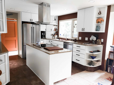 Customer kitchen with the Proline PLFI 544 - Ducted Island Range Hood, 600 CFM | Stainless Steel Finish