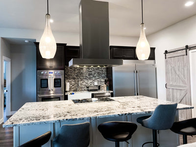 Customer kitchen with the Proline PLFI 755 - Island Range Hood, 1100 CFM | Stainless Steel, Outdoor Rated Finish Option