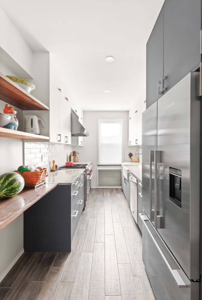 Customer kitchen with the Proline PLJW 109 - Wall-Mounted Range Hood, 1000/2000 CFM | Convertible to Ductless, Stainless Steel Finish, Outdoor Rated
