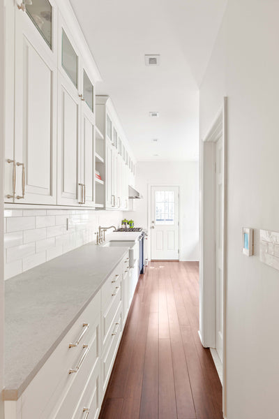 Customer kitchen with the Proline PLJW 113 - Under Cabinet Vent Hood, 900 CFM | Convertible to Ductless, Stainless Steel with Modern Control Panel