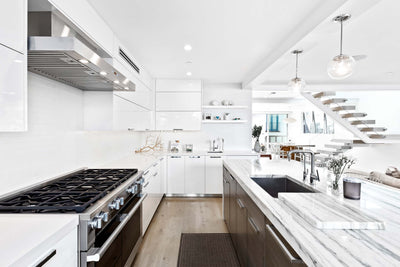 Customer kitchen with the Proline PLFW 750 - Ducted Wall-Mounted Range Hood, 900/1100 CFM | Stainless Steel Finish