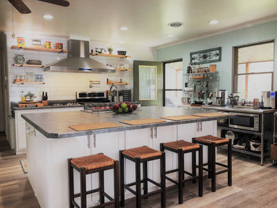 Customer kitchen with the Proline ProSW - Professional Wall-Mounted Range Hood, 1800 CFM | LED Lighting, Stainless Steel Finish
