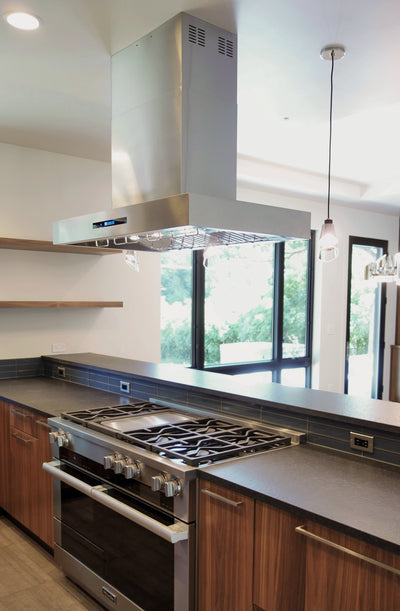 Customer kitchen with the Proline PLFI 755 - Island Range Hood, 1100 CFM | Stainless Steel, Outdoor Rated Finish Option