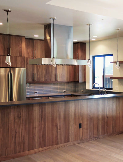 Customer kitchen with the Proline PLFI 755 - Island Range Hood, 1100 CFM | Stainless Steel, Outdoor Rated Finish Option