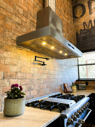 Customer kitchen with the Proline PLFW 755 - Ducted Wall-Mounted Range Hood, 1100 CFM | Stainless Steel, Outdoor Rated Finish Option