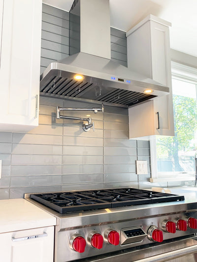 Customer kitchen with the Proline PLFW 129 J - Wall-Mounted Vent Hood, 900 CFM | Stainless Steel