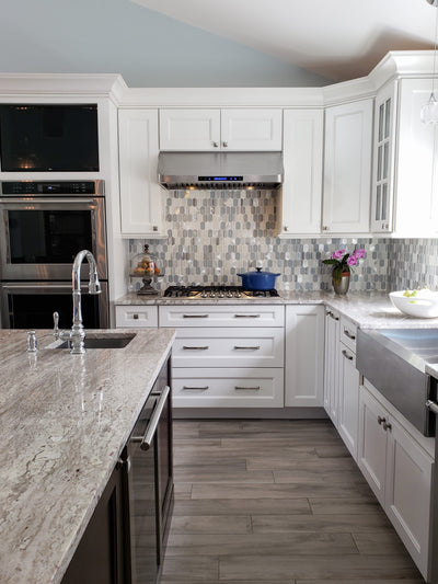Customer kitchen with the PLJW 120 - Under Cabinet Range Hood, 900/1800 CFM | Stainless Steel, Convertible to Ductless