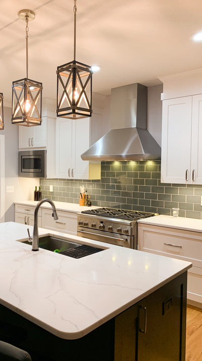 Customer kitchen with the Proline PLJW 109 WC - Ducted Wall-Mounted Range Hood, 1200 CFM | Stainless Steel Finish, Outdoor Rated