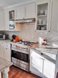 Proline PLJW 185 stainless steel dual blower range hood over gas stove. ProlineRangeHoods.com.