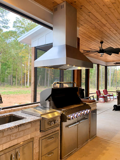 Customer kitchen with the Proline PLJI 103 - Ducted Island Range Hood, 1200 CFM | Stainless Steel Finish, Outdoor Rated Finish Option