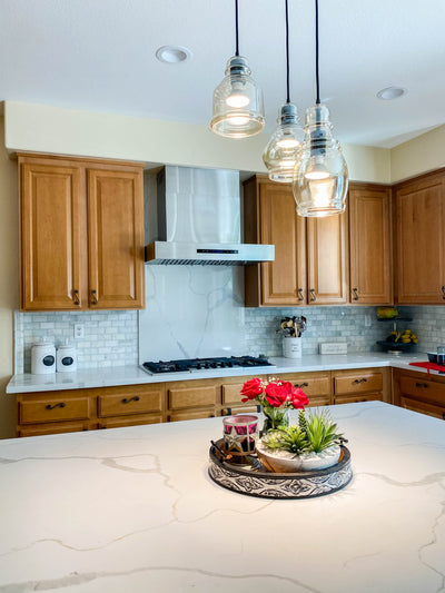 Customer kitchen with the Proline PLFW 755 - Ducted Wall-Mounted Range Hood, 1100 CFM | Stainless Steel, Outdoor Rated Finish Option