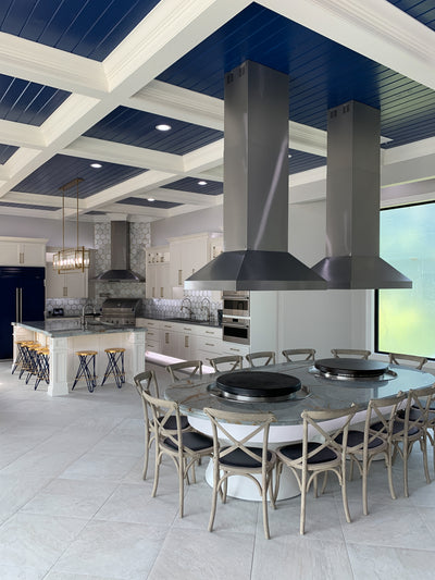 Customer kitchen with the Proline ProSI Ducted Island Range Hood, 900/1800 CFM | 430/304 Stainless Steel Finish