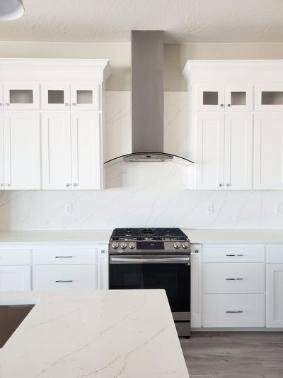 Customer kitchen with the Proline PLFW 544 - Wall-Mounted Range Hood, 600 CFM | Convertible to Ductless, Stainless Steel Finish