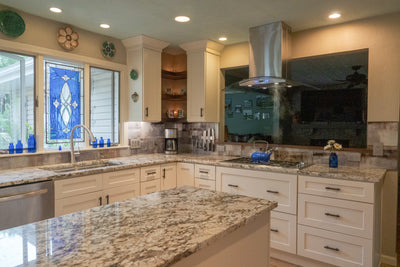 Customer kitchen with the Proline PLFI 544 - Ducted Island Range Hood, 600 CFM | Stainless Steel Finish