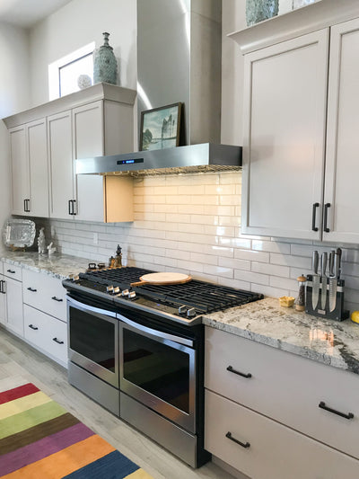Customer kitchen with the Proline PLFW 755 - Ducted Wall-Mounted Range Hood, 1100 CFM | Stainless Steel, Outdoor Rated Finish Option