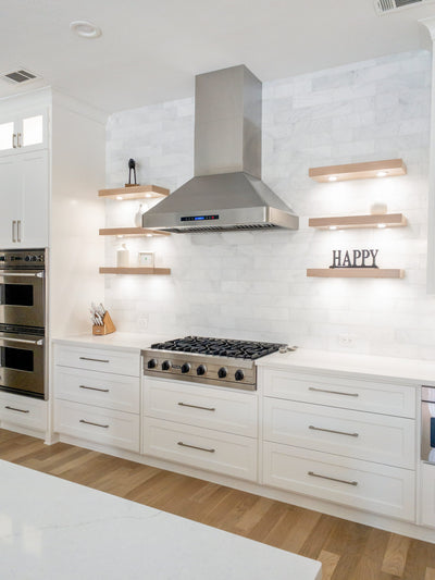 Customer kitchen with the Proline PLJW 130 - Ducted Wall-Mounted Range Hood, 900/1200 CFM | Stainless Steel Finish