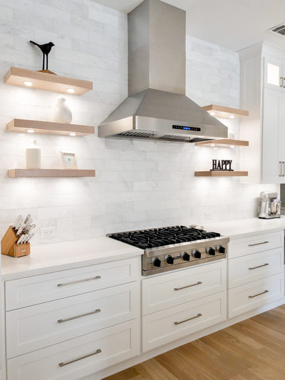Customer kitchen with the Proline PLJW 130 - Ducted Wall-Mounted Range Hood, 900/1200 CFM | Stainless Steel Finish