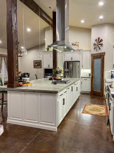 Customer kitchen with the Proline PLFI 520 - Ducted Island Range Hood, 600/1100 CFM | Stainless Steel Finish