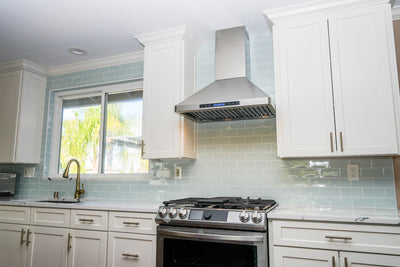 Customer kitchen with the Proline PLFW 129 E - Wall-Mounted Range Hood, 900 CFM | Stainless Steel Design
