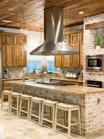 Customer kitchen with the Proline ProSI Ducted Island Range Hood, 900/1800 CFM | 430/304 Stainless Steel Finish