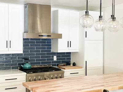 Customer kitchen with the Proline PLFW 755 - Ducted Wall-Mounted Range Hood, 1100 CFM | Stainless Steel, Outdoor Rated Finish Option