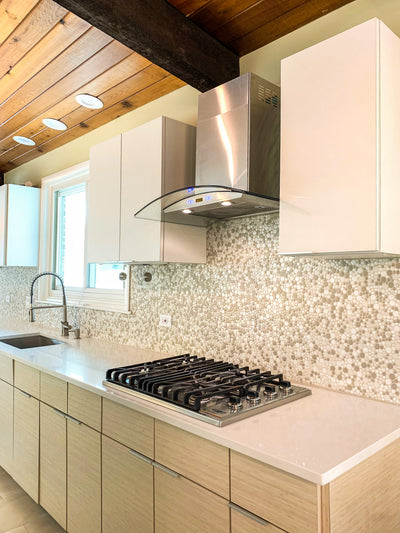 Customer kitchen with the Proline PLFW 544 - Wall-Mounted Range Hood, 600 CFM | Convertible to Ductless, Stainless Steel Finish
