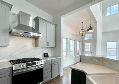 Customer kitchen with the Proline ProSW - Professional Wall-Mounted Range Hood, 1800 CFM | LED Lighting, Stainless Steel Finish