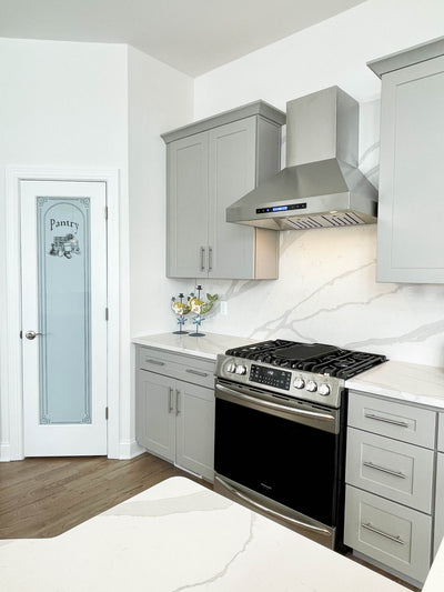 Customer kitchen with the Proline ProSW - Professional Wall-Mounted Range Hood, 1800 CFM | LED Lighting, Stainless Steel Finish