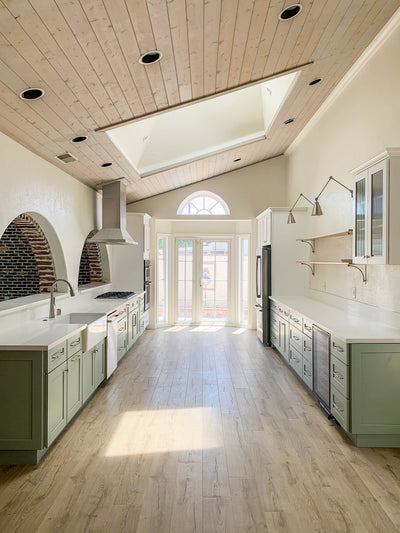 Customer kitchen with the Proline PLFI 520 - Ducted Island Range Hood, 600/1100 CFM | Stainless Steel Finish