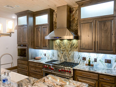 Customer kitchen with the Proline PLJW 130 - Ducted Wall-Mounted Range Hood, 900/1200 CFM | Stainless Steel Finish