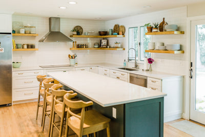 Customer kitchen with the Proline PLJW 129 - Ducted Indoor/Outdoor Wall-Mounted Range Hood, 900/1200 CFM | Stainless Steel Finish