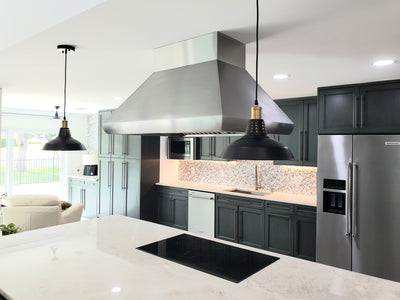 Customer kitchen with the Proline PLJI 109 - Ducted Island Range Hood, 1200 CFM | Stainless Steel Finish